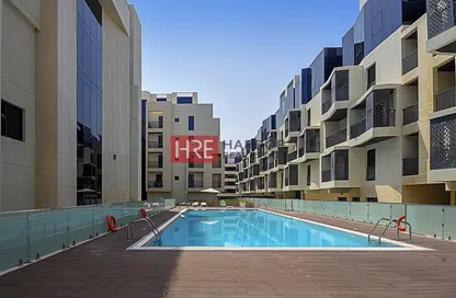 صورة لـ حوض سباحة شقة - 3 غرف نوم - 4 حمامات للايجار في جناين افنيو - مردف هيلز - مردف - دبي ، صورة رقم 1