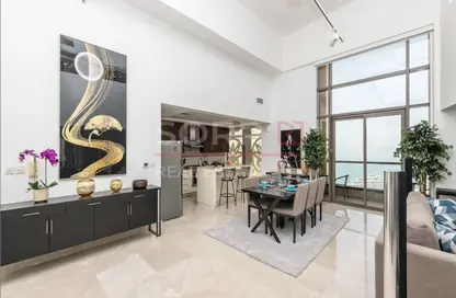 Living / Dining Room image for: Apartment - 3 Bedrooms - 4 Bathrooms for rent in Shams 1 - Shams - Jumeirah Beach Residence - Dubai, Image 1