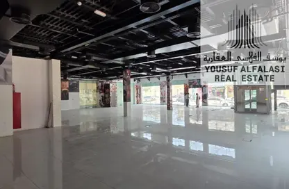 Shop - Studio - 2 Bathrooms for rent in Al Rumailah building - Al Rumailah 2 - Al Rumaila - Ajman