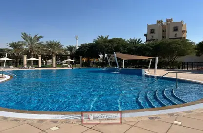Pool image for: Apartment - 1 Bedroom - 1 Bathroom for sale in Al Thamam 01 - Al Thamam - Remraam - Dubai, Image 1