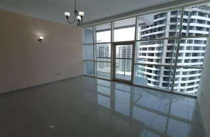 Empty Room image for: Apartment - 2 Bedrooms - 2 Bathrooms for sale in Oasis Tower 1 - Dubai Sports City - Dubai, Image 1