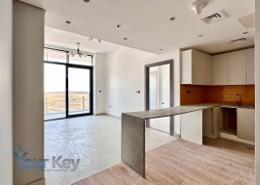 صورةمطبخ لـ: شقة - 2 غرف نوم - 3 حمامات للبيع في ذا في تاور - مجمع دبي ريزيدنس - دبي, صورة 1