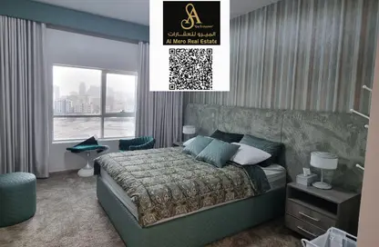 شقة - غرفة نوم - 2 حمامات للبيع في أورينت تاور 1 - أورينت تاور - البستان - عجمان