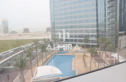 Pool image for: Apartment - 1 Bedroom - 2 Bathrooms for sale in C2 Tower - City Of Lights - Al Reem Island - Abu Dhabi, Image 1