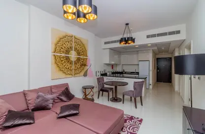 Living / Dining Room image for: Apartment - 1 Bedroom - 2 Bathrooms for sale in Ghalia - District 18 - Jumeirah Village Circle - Dubai, Image 1