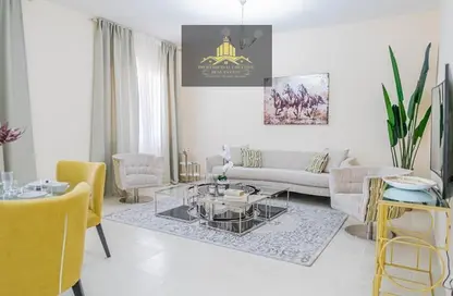 Living Room image for: Apartment - 1 Bedroom - 2 Bathrooms for sale in Al Ameera Village - Ajman, Image 1