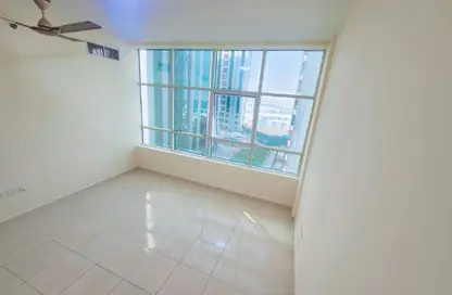 شقة - غرفة نوم - 2 حمامات للايجار في أورينت تاور 1 - أورينت تاور - البستان - عجمان