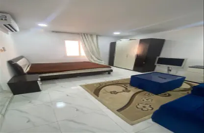 Living Room image for: Apartment - 1 Bathroom for rent in C2302 - Khalifa City A - Khalifa City - Abu Dhabi, Image 1