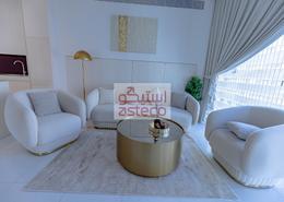 صورةغرفة المعيشة لـ: شقة - 2 غرف نوم - 2 حمامات للكراء في برج محمد بن راشد في المركز التجاري العالمي - شارع الكورنيش - أبوظبي, صورة 1