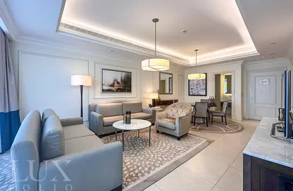 Living / Dining Room image for: Apartment - 1 Bedroom - 2 Bathrooms for rent in Kempinski BLVD - Downtown Dubai - Dubai, Image 1