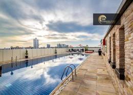 Pool image for: Apartment - 1 bedroom - 2 bathrooms for rent in Pantheon Boulevard - Jumeirah Village Circle - Dubai, Image 1