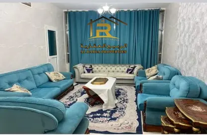 Living Room image for: Apartment - 1 Bedroom - 2 Bathrooms for sale in Liwara 1 - Ajman, Image 1