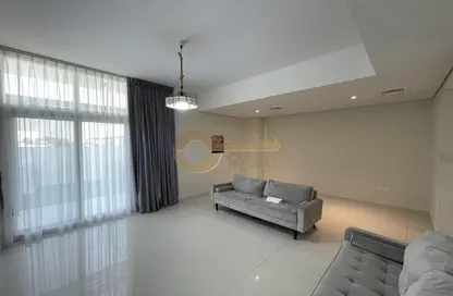 Living Room image for: Townhouse - 3 Bedrooms - 5 Bathrooms for rent in Trixis - The Roots DAMAC Hills 2 - Damac Hills 2 - Dubai, Image 1