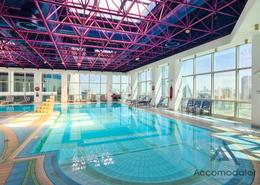 Pool image for: Apartment - 2 bedrooms - 2 bathrooms for rent in Baynuna Tower 1 - Corniche Road - Abu Dhabi, Image 1
