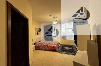 شقة - غرفة نوم - 2 حمامات للايجار في أورينت تاور 1 - أورينت تاور - البستان - عجمان