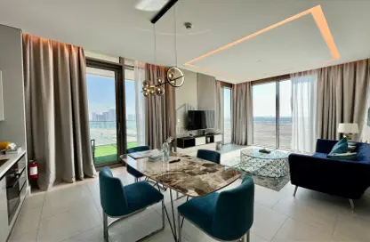 Living / Dining Room image for: Apartment - 1 Bedroom - 2 Bathrooms for sale in SLS Dubai Hotel  and  Residences - Business Bay - Dubai, Image 1