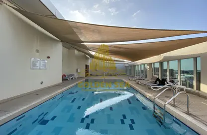 Pool image for: Apartment - 1 Bedroom - 2 Bathrooms for rent in C31 - Al Seef - Al Raha Beach - Abu Dhabi, Image 1