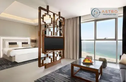 Living Room image for: Apartment - 1 Bedroom - 1 Bathroom for sale in Wyndham Dubai Marina - Dubai Marina - Dubai, Image 1