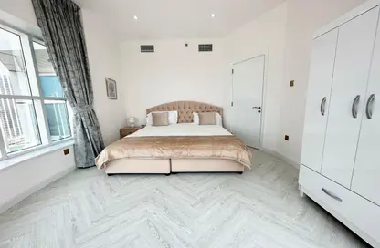 صورة لـ غرفة- غرفة النوم شقة - غرفة نوم - 1 حمام للايجار في بوابة دبي الجديدة 2 - بحيرة إلوشيو - أبراج بحيرة الجميرا - دبي ، صورة رقم 1