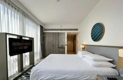 صورة لـ غرفة- غرفة النوم شقة - 1 حمام للبيع في ذا ون في جميرا فيلاج سيركل - قرية الجميرا سركل - دبي ، صورة رقم 1