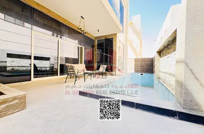 Villa - 5 Bedrooms - 7 Bathrooms for sale in Ajman Hills - Al Alia - Ajman