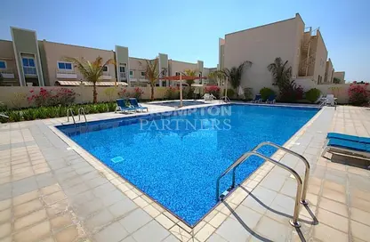 Villa - 4 Bedrooms - 4 Bathrooms for rent in Liwa Oasis compound - Khalifa City - Abu Dhabi