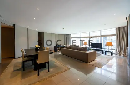 Living / Dining Room image for: Apartment - 2 Bedrooms - 3 Bathrooms for sale in Armani Residence - Burj Khalifa Area - Downtown Dubai - Dubai, Image 1