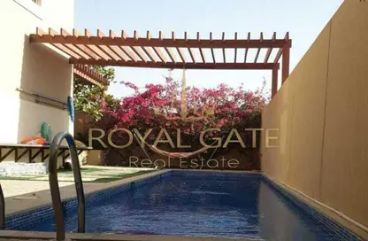 Pool image for: Villa - 4 Bedrooms - 6 Bathrooms for sale in Lehweih Community - Al Raha Gardens - Abu Dhabi, Image 1