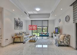 Living Room image for: Villa - 4 bedrooms - 6 bathrooms for sale in Casa Flores - Green Community Motor City - Motor City - Dubai, Image 1