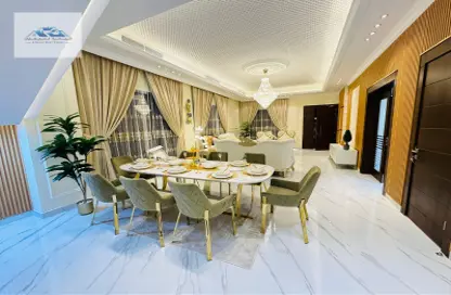 Dining Room image for: Villa - 5 Bedrooms - 7 Bathrooms for sale in Al Zaheya Gardens - Al Zahya - Ajman, Image 1