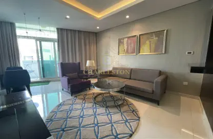 Living Room image for: Apartment - 1 Bedroom - 2 Bathrooms for rent in Damac Maison The Distinction - Downtown Dubai - Dubai, Image 1