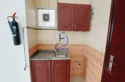 Kitchen image for: Apartment - 1 Bathroom for rent in Al Thani Muwaileh - Muwaileh Commercial - Sharjah, Image 1