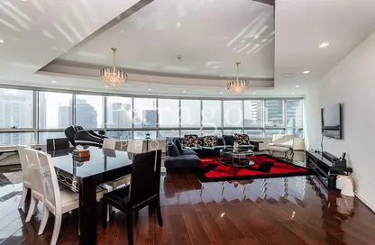 Living / Dining Room image for: Apartment - 4 Bedrooms - 3 Bathrooms for rent in Horizon Tower - Dubai Marina - Dubai, Image 1