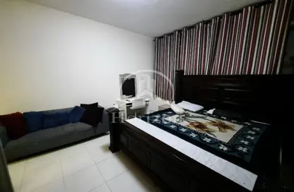 Room / Bedroom image for: Apartment - 1 Bathroom for rent in Al Majaz Tower - Al Majaz - Sharjah, Image 1