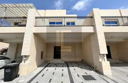 Outdoor Building image for: Townhouse - 4 Bedrooms - 4 Bathrooms for rent in Aknan Villas - Victoria - Damac Hills 2 - Dubai, Image 1