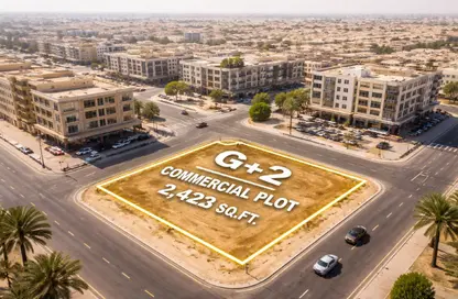 أرض - استوديو للبيع في العذيب - ضاحية الرويضات - الشارقة