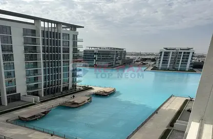 Pool image for: Apartment - 1 Bedroom - 2 Bathrooms for rent in Residences 16 - District One - Mohammed Bin Rashid City - Dubai, Image 1