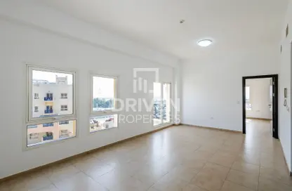 Empty Room image for: Apartment - 1 Bedroom - 2 Bathrooms for sale in Al Ramth 21 - Al Ramth - Remraam - Dubai, Image 1