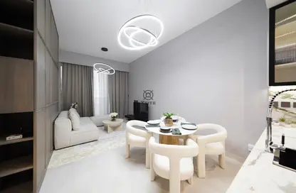 Living / Dining Room image for: Apartment - 2 Bedrooms - 3 Bathrooms for sale in Amal Tower - Dubai Sports City - Dubai, Image 1
