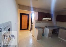Kitchen image for: Apartment - 1 bedroom - 1 bathroom for sale in Jasmine Towers - Garden City - Ajman, Image 1