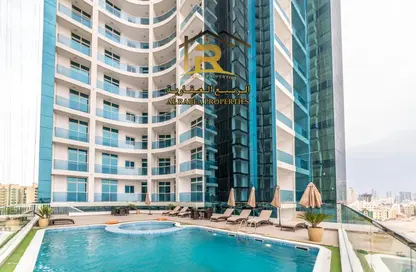 Pool image for: Apartment - 1 Bathroom for sale in Oasis Tower - Al Rashidiya 1 - Al Rashidiya - Ajman, Image 1
