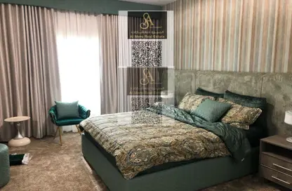 Apartment - 1 Bedroom - 2 Bathrooms for sale in Orient Tower 1 - Orient Towers - Al Bustan - Ajman