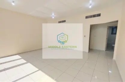 Empty Room image for: Apartment - 2 Bedrooms - 3 Bathrooms for rent in Al Taghreed Tower - Airport Road - Abu Dhabi, Image 1