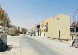 Land for sale in Ajman Global City - Al Alia - Ajman
