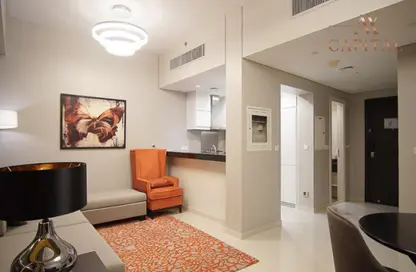 Living Room image for: Apartment - 1 Bedroom - 2 Bathrooms for sale in Artesia C - Artesia - DAMAC Hills - Dubai, Image 1