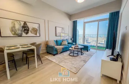 Living / Dining Room image for: Apartment - 1 Bedroom - 2 Bathrooms for rent in Bloom Heights - Jumeirah Village Circle - Dubai, Image 1