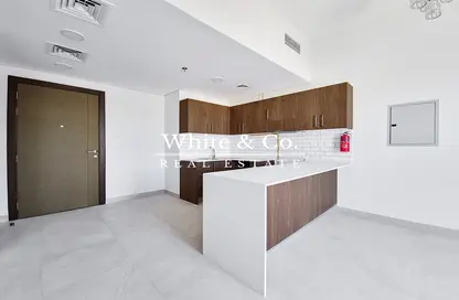 صورة لـ مطبخ شقة - غرفة نوم - 1 حمام للبيع في كازا جراندي - قرية الجميرا سركل - دبي ، صورة رقم 1