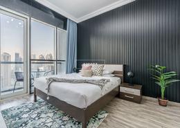 Room / Bedroom image for: Apartment - 1 bedroom - 2 bathrooms for sale in MAG 214 - Lake Elucio - Jumeirah Lake Towers - Dubai, Image 1