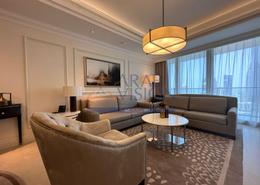 صورةغرفة المعيشة لـ: شقة - 1 غرفة نوم - 2 حمامات للكراء في فندق العنوان - بوليفارد - دبي وسط المدينة - دبي, صورة 1
