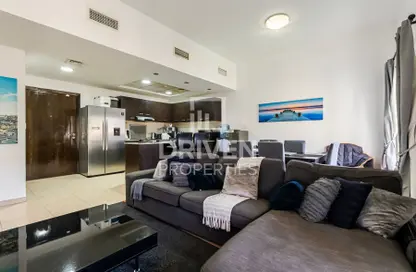 Living / Dining Room image for: Apartment - 2 Bedrooms - 2 Bathrooms for sale in Al Thamam 30 - Al Thamam - Remraam - Dubai, Image 1
